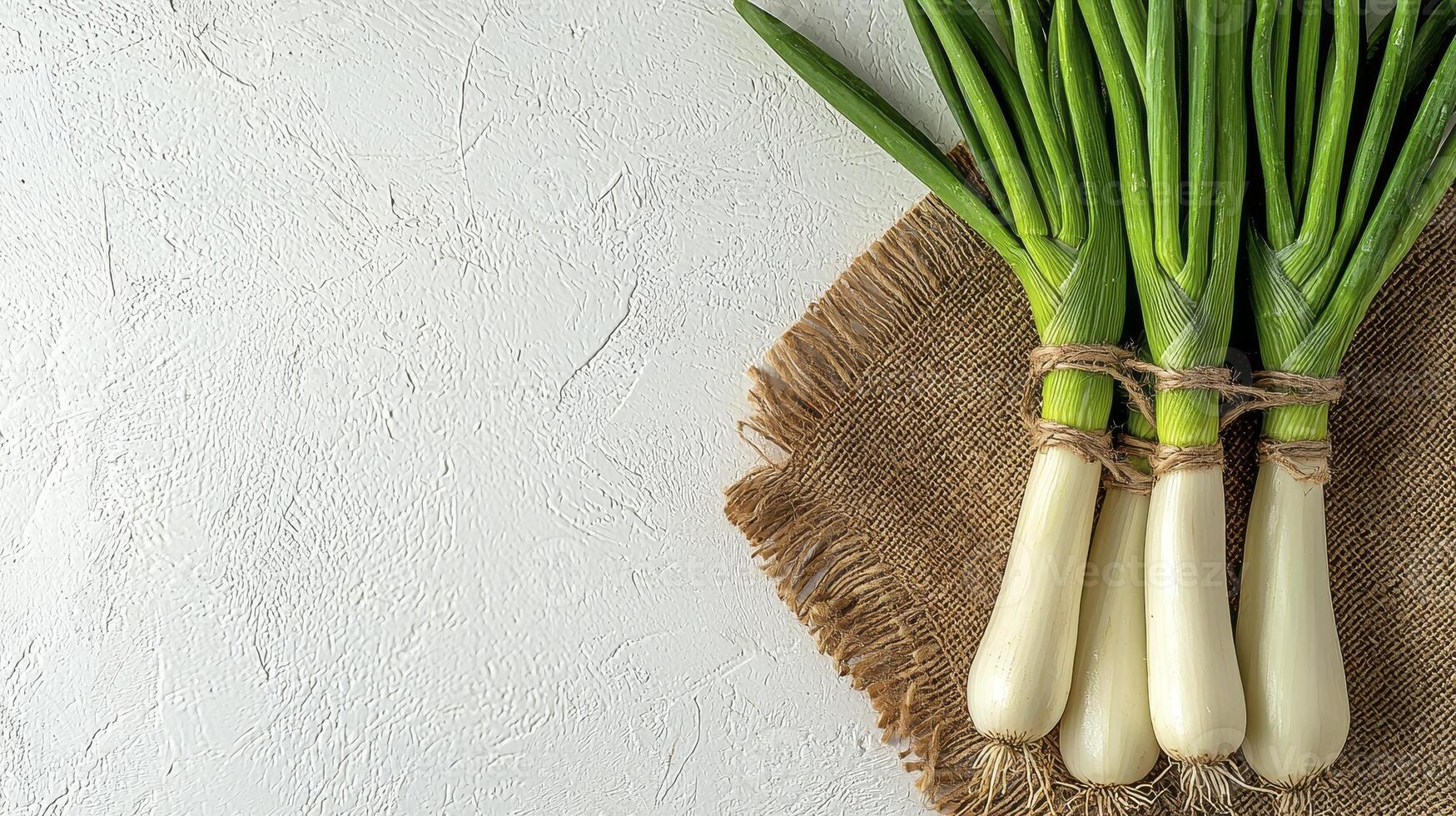 Fresh Spring Onions on Burlap A Culinary Delight and Healthy Ingredient Discover the Vibrant Greens and Crisp Whites of These Seasonal Vegetables, Perfect for Salads, Soups, and Stir-Fries Explore photo