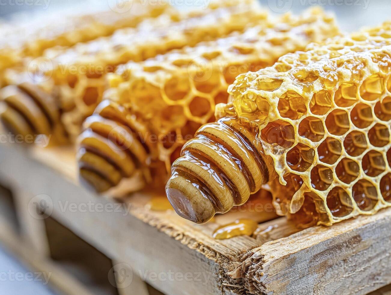 Captivating Close-Up of Golden Honeycomb Sections Showcasing the Intricate Beauty of Nature's Sweetest Creation, Detailed Textures and Warm, Inviting Colors Highlight the Natural Elegance of the photo
