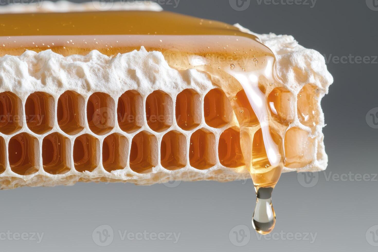 Captivating Honeycomb Close-Up A Golden Cascade of Natural Sweetness Unveiled, Discover the Intricate Details of Bee-Crafted Wax Cells, Showcasing Liquid Gold Drizzling Down, Experience the Richness photo