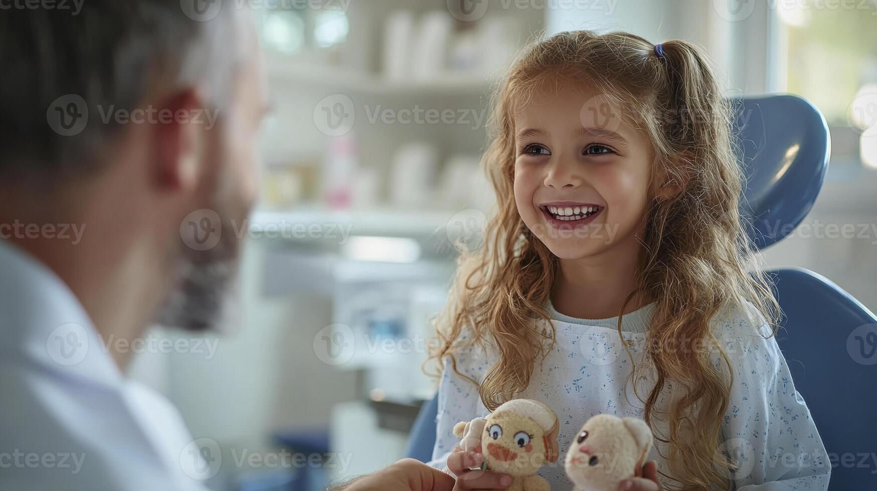 In a heartwarming display of pediatric care, a smiling doctor engages with a young child, fostering a comfortable and trusting environment The doctor holds a playful toy, using it as a tool to photo