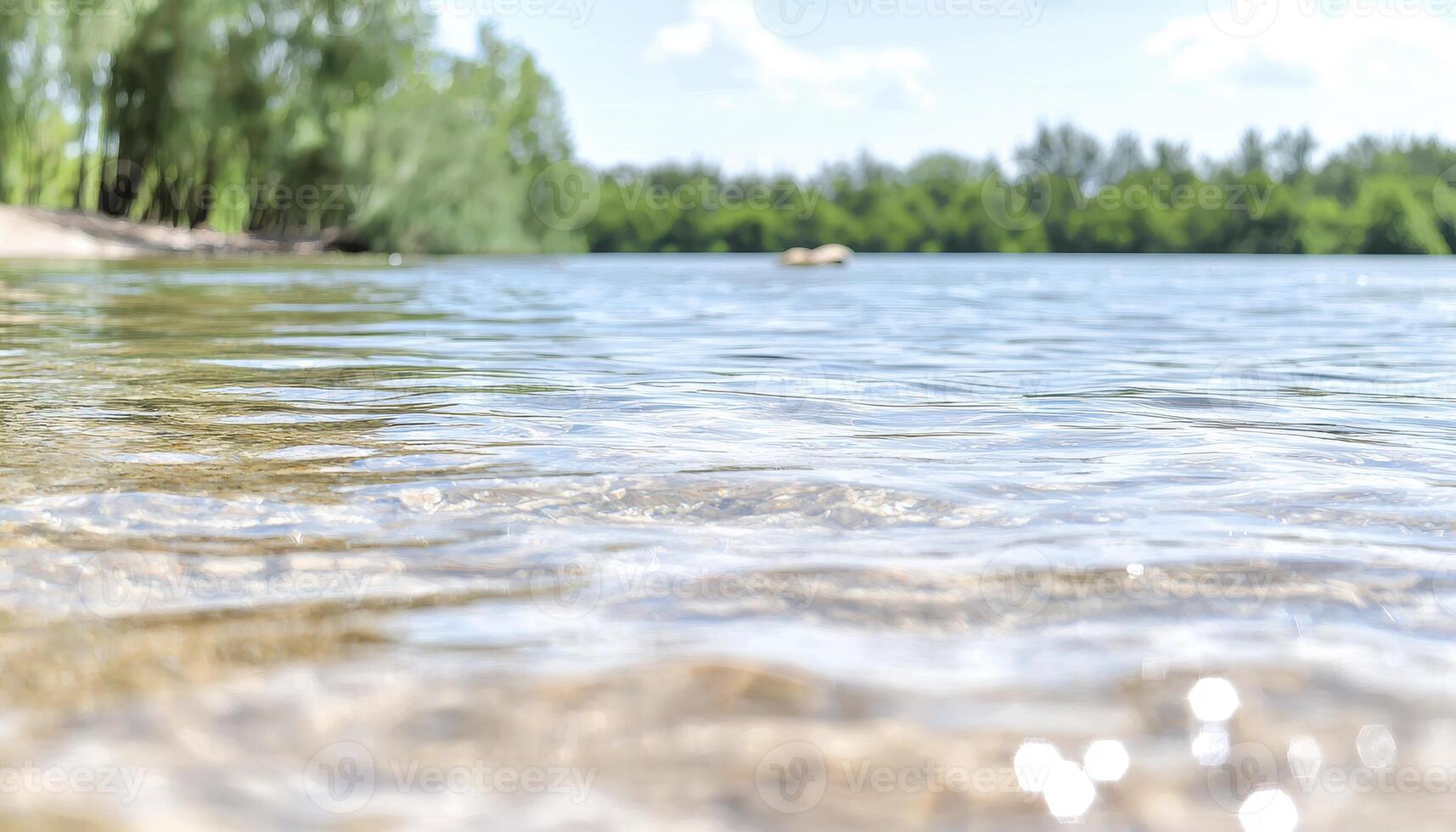 Beneath a sky washed with the soft hues of dawn, a river awakens, its surface a mirror reflecting the vibrant dance of sunlight Gentle ripples, like whispers carried on the breeze, trace patterns photo