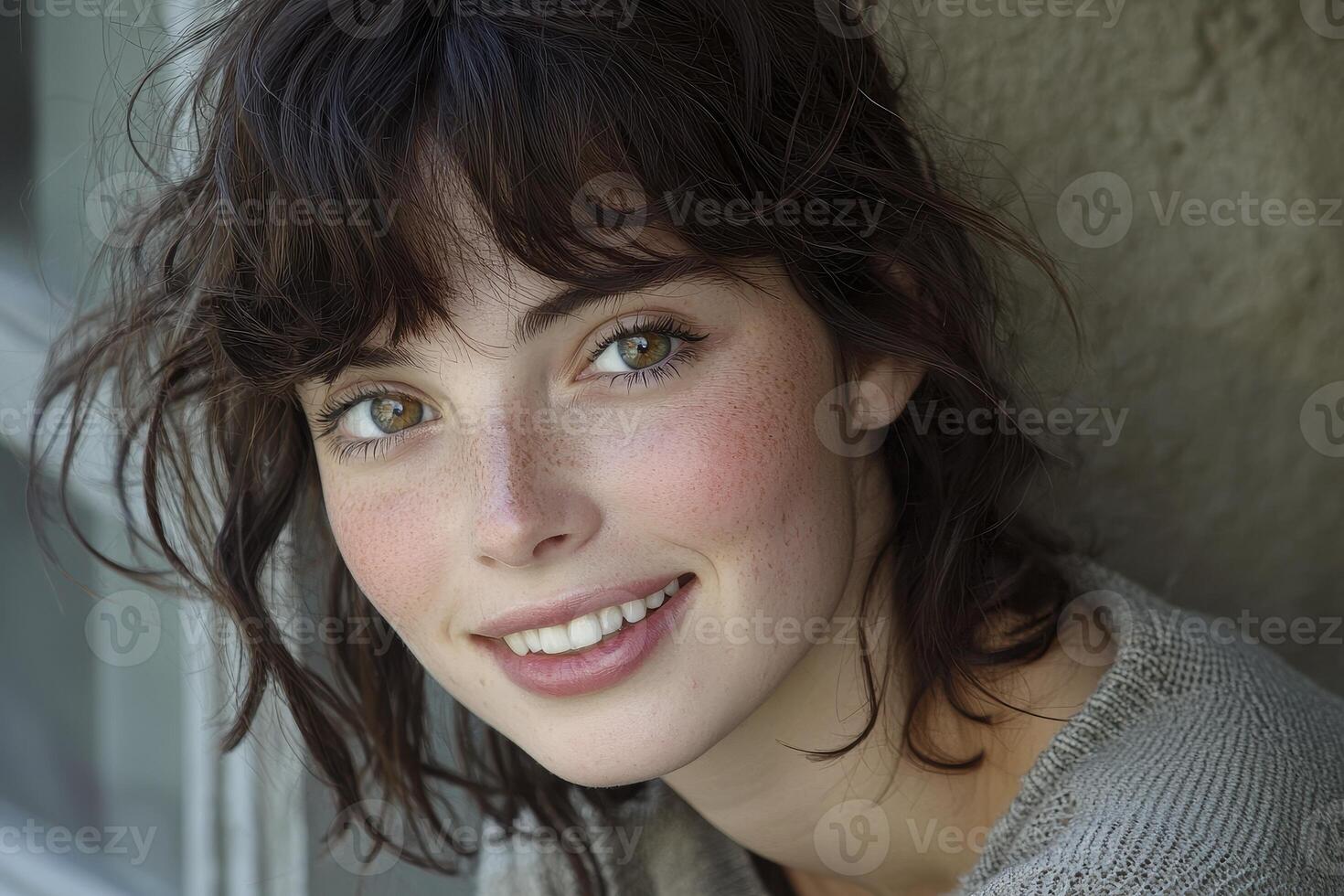 Capture the essence of pure joy in this intimate portrait Witness the dance of light upon her skin, reflecting inner happiness and contentment A gentle breeze teases soft strands of hair, framing a photo