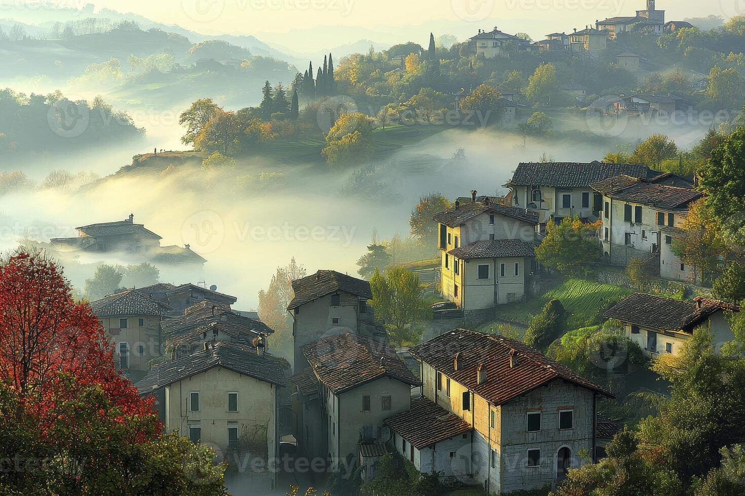 Enshrouded in mystery, a timeless vista unfolds where jagged peaks meet the ethereal embrace of swirling fog, a symphony of nature's artistry The rugged mountains stand as silent sentinels, their photo