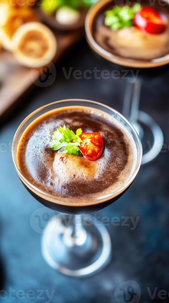 Luxurious chocolate martini garnished with a cherry on top served in a classy glass setting for a perfect evening photo