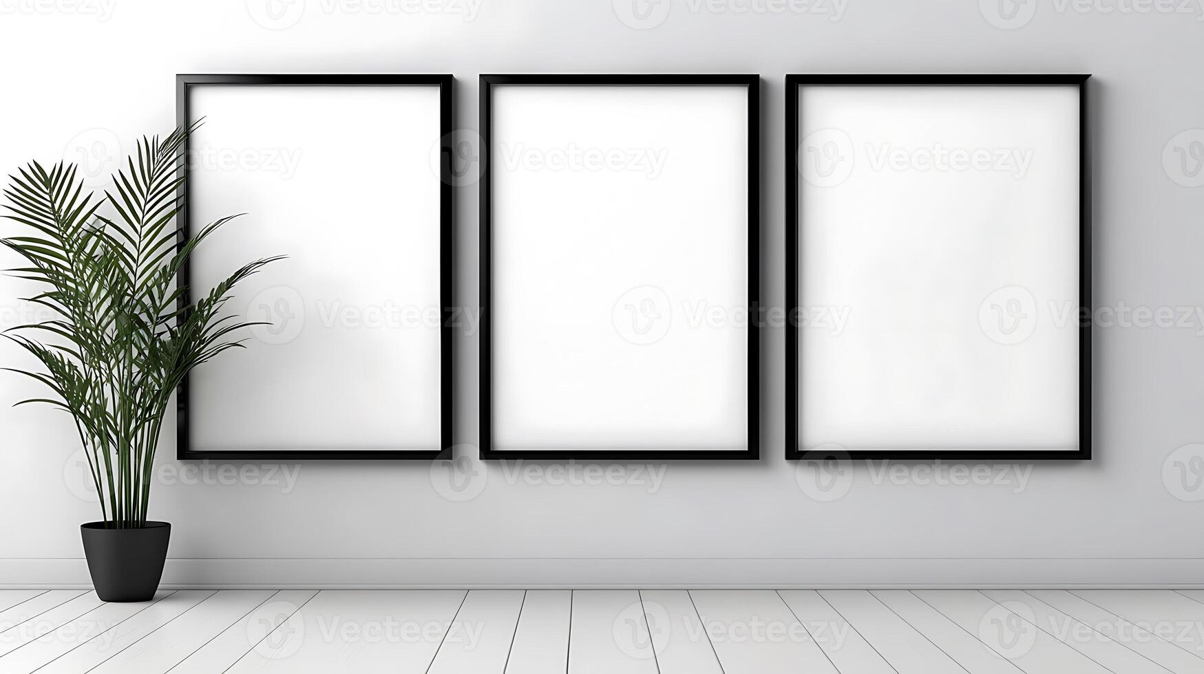 Three empty frames on a wall with a plant in front photo