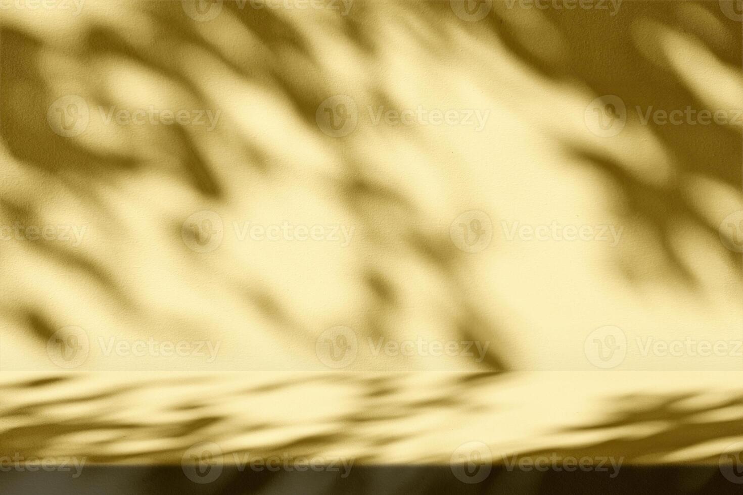 Stucco Table with Nature Shadow and Fortuna Gold Light on Concrete Wall Texture Background photo