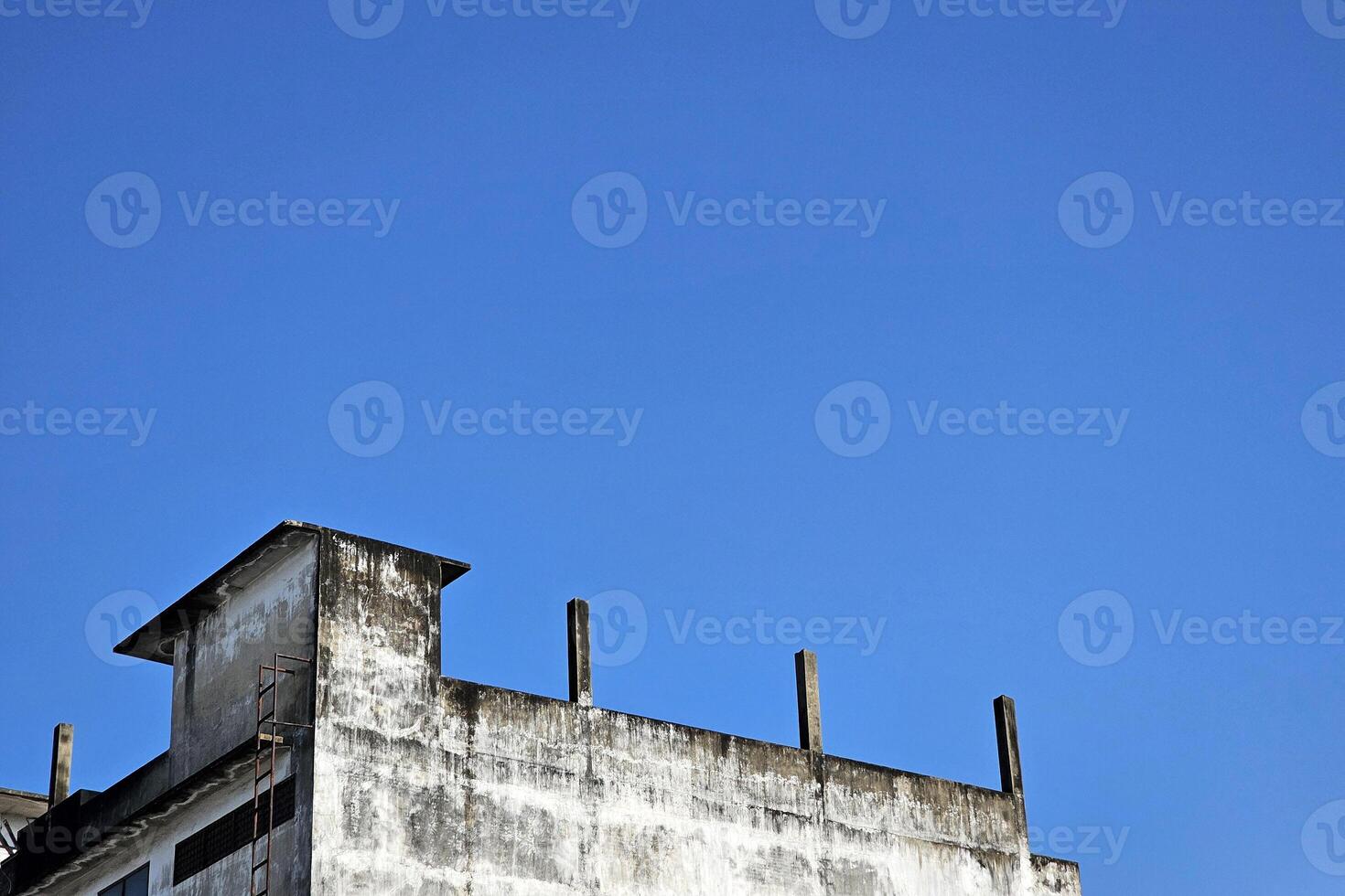 Minimal Old Building with Blue Sky Background. photo