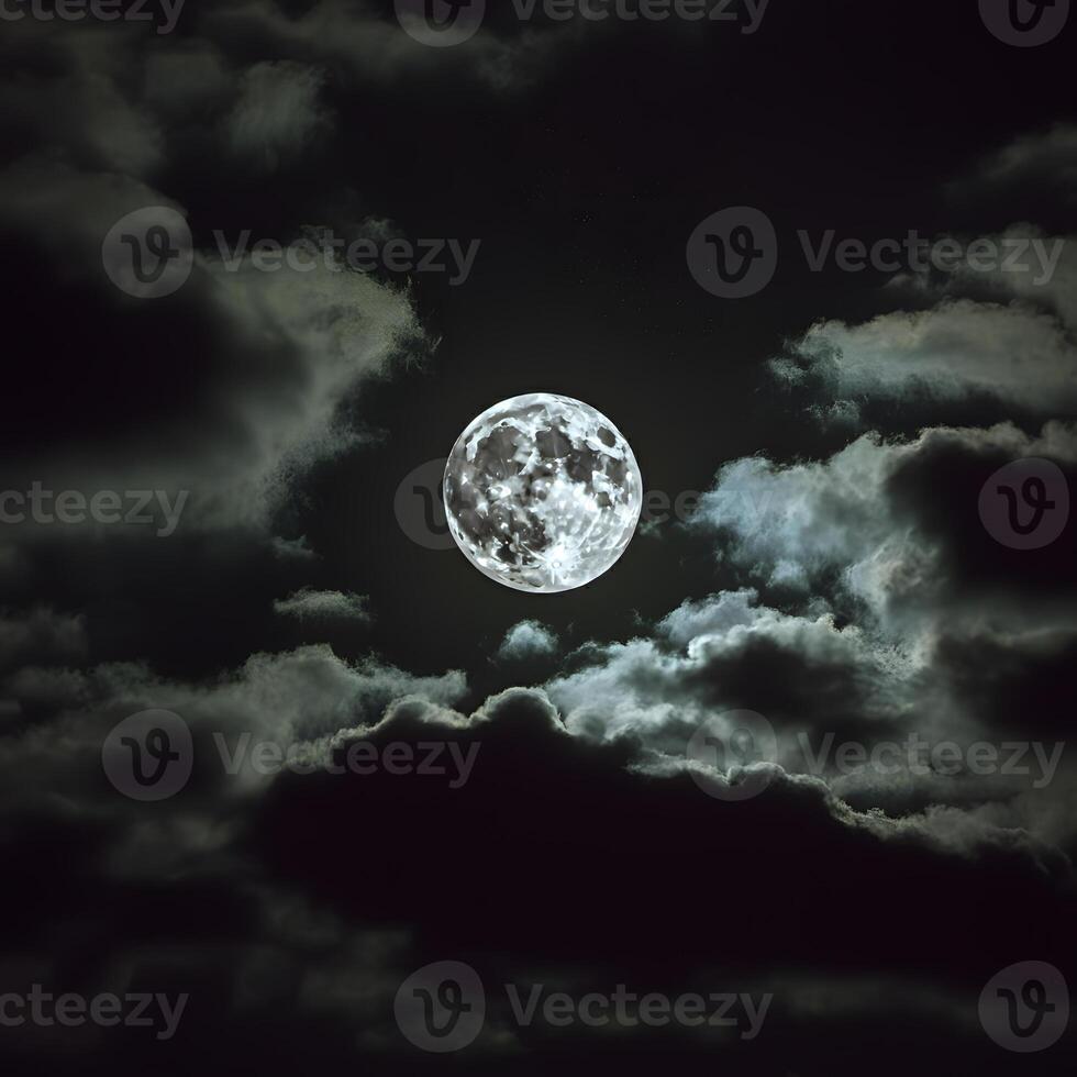 Bright full moon illuminating swirling dark clouds at night in moody atmospheric sky photo