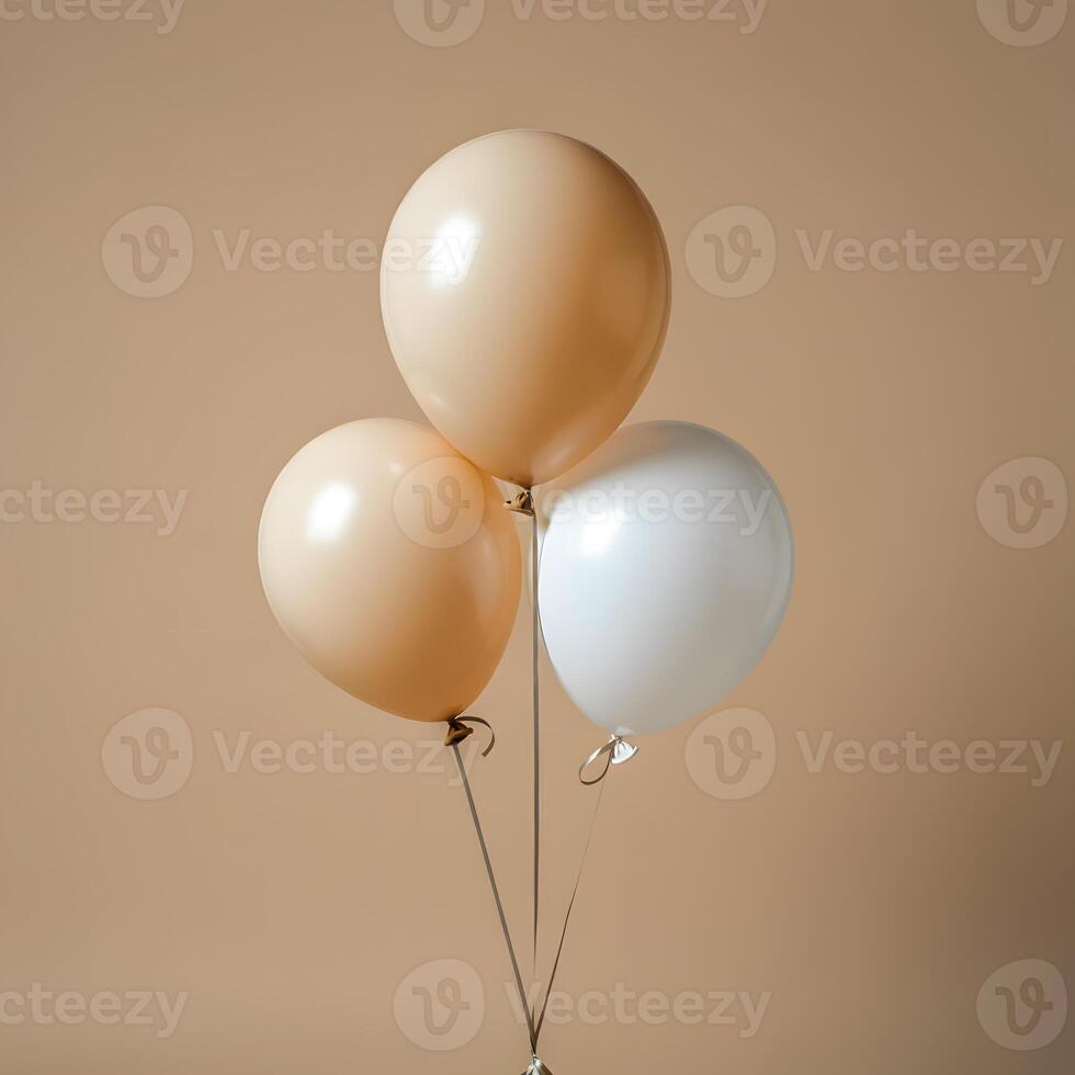 Beige and white balloon floating with delicate ribbons against neutral background minimal elegant party decor concept photo