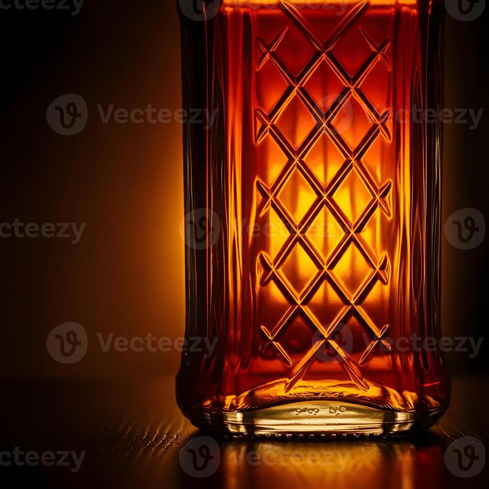 Elegant whiskey bottle close up with amber liquid reflecting warm golden light in dark background luxury alcohol beverage concept photo