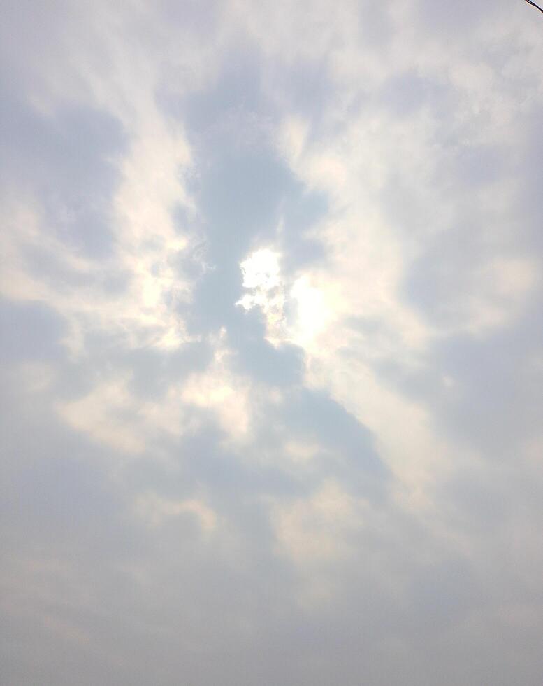 Sun Shining Through Partly Cloudy Sky Natural Light Rays photo