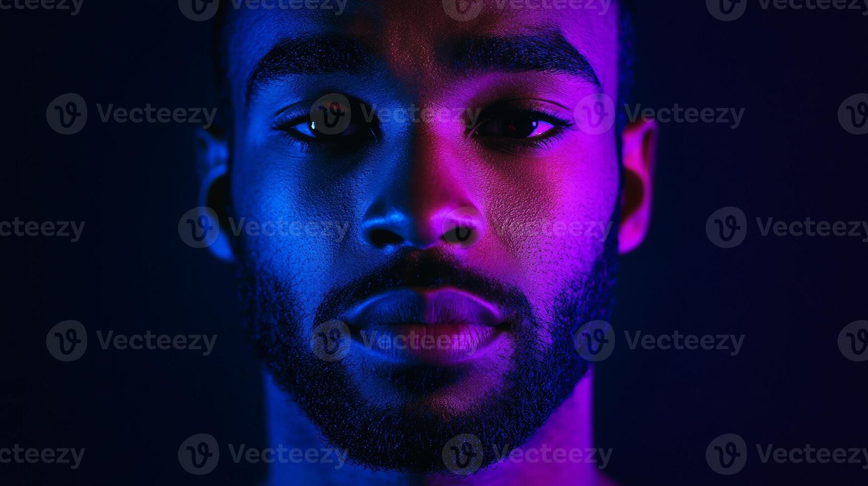 Portrait of a young african male with neon lighting photo