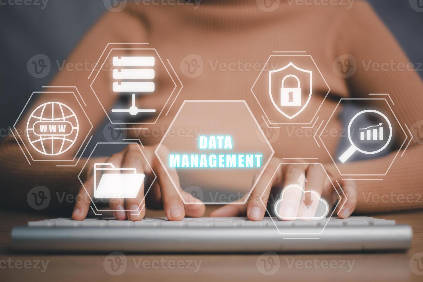 Data management concept, Person hand typing on keyboard with data management icon on virtual screen, information technology concept. photo