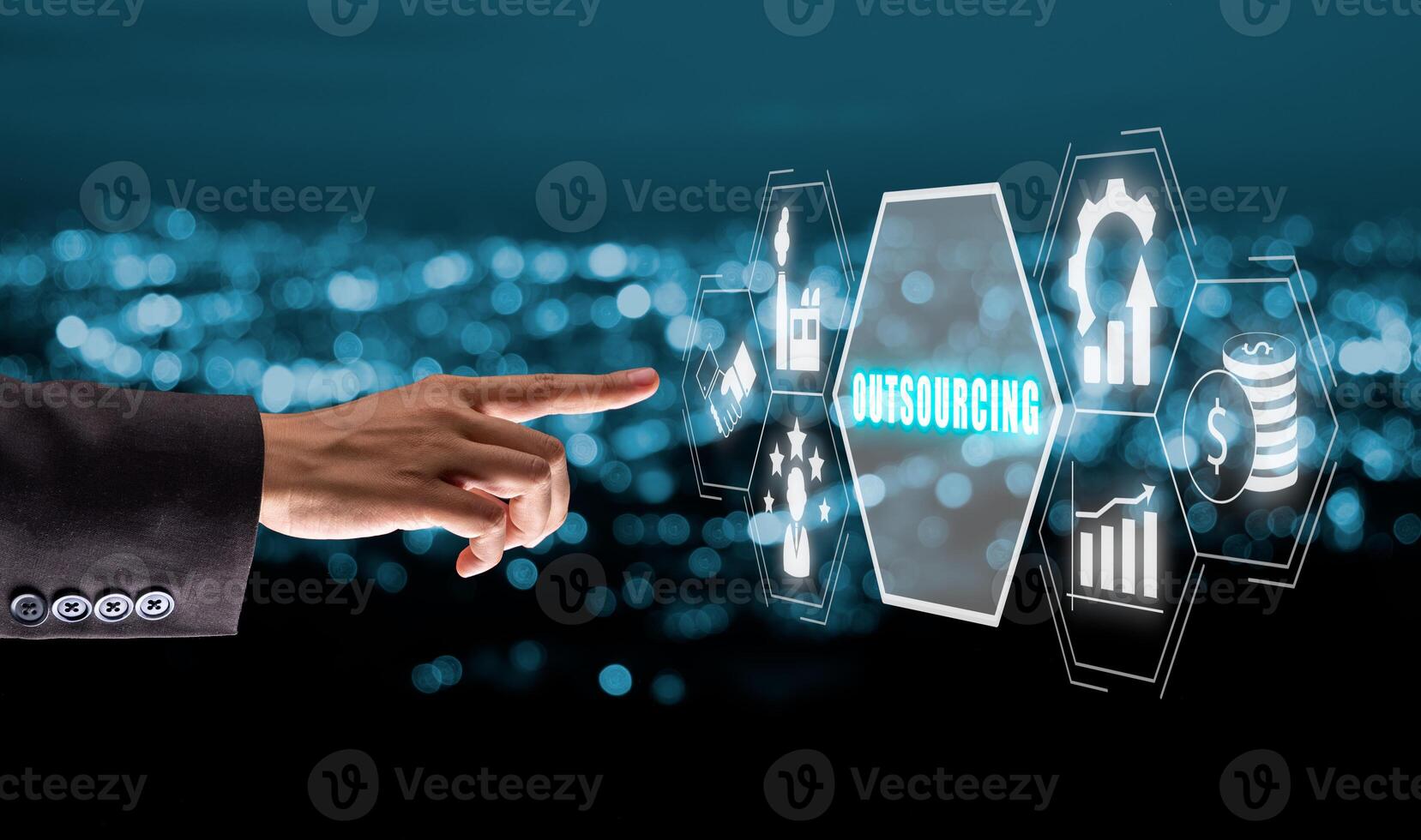 Outsourcing Global Recruitment Business and internet concept, Business person hand touching outsourcing icon on virtual screen with blue bokeh background. photo