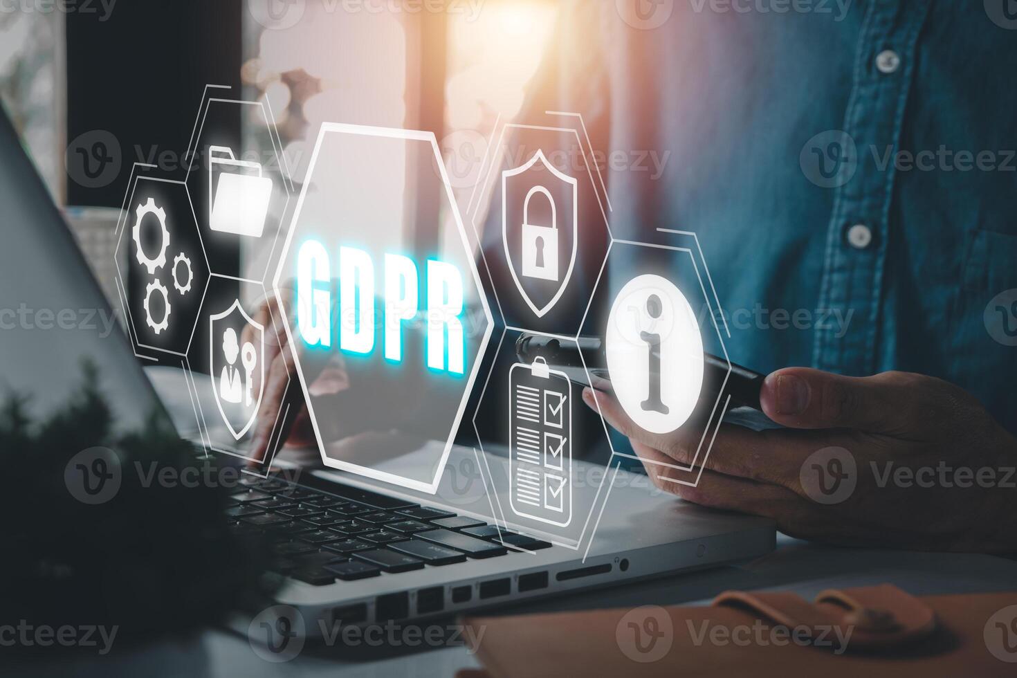 GDPR, General Data Protection Regulation concept, Person using laptop and smart phone on office desk with eneral Data Protection Regulation icon on virtual screen, Cyber security and privacy. photo