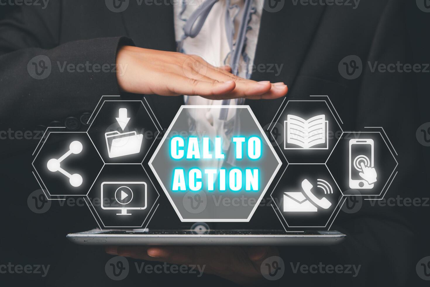 Call to action concept, Person hand holding digital tablet with call to action icon on virtual screen. photo