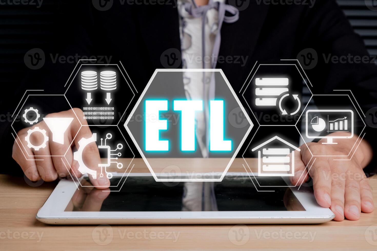 ETL extract transform load concept, Person using digital tablet with extract transform load icon on virtual screen. photo