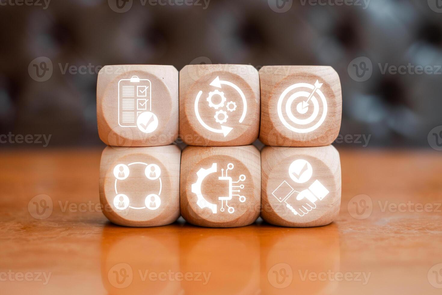 Wooden blocks with procurement management icons symbolizing strategy, efficiency, and business processes. photo