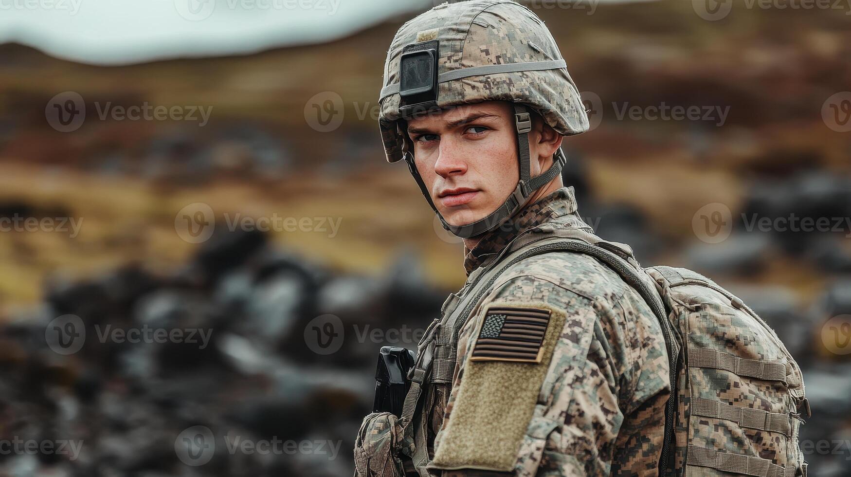 Soldier in Combat Uniform with Tactical Gear in Outdoor Terrain, Concept of Military Service, Duty, Patriotism, Armed Forces, and Tactical Readiness photo