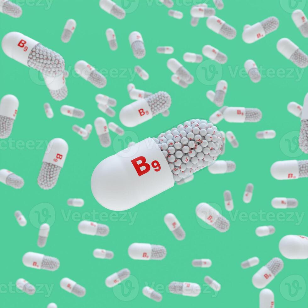 Close-up of a pill capsule with the label Vitamin B9 photo