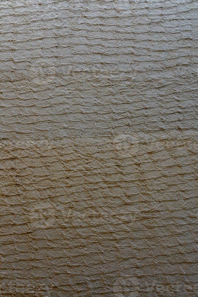 Textured surface conveying warmth and depth in natural tones for artistic inspiration and design photo