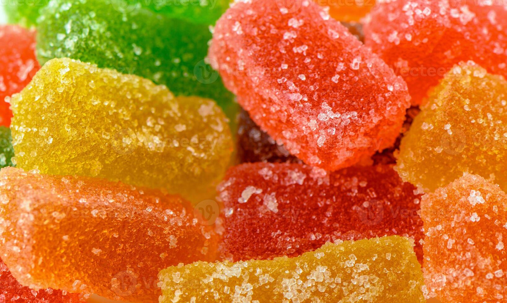 Colorful assortment of gummy candies brings joy to every sweet tooth in a bright, vibrant setting photo
