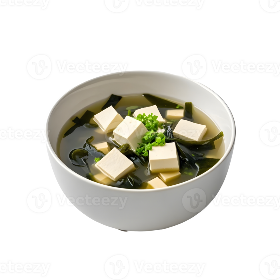A bowl of soup with tofu and green vegetables png