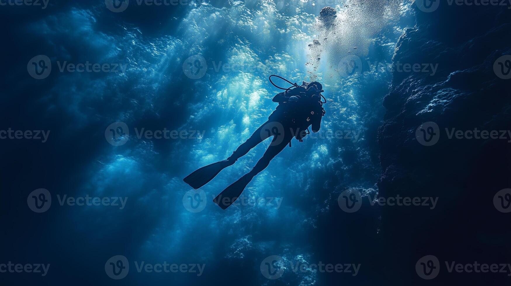 A scuba diver in the ocean photo