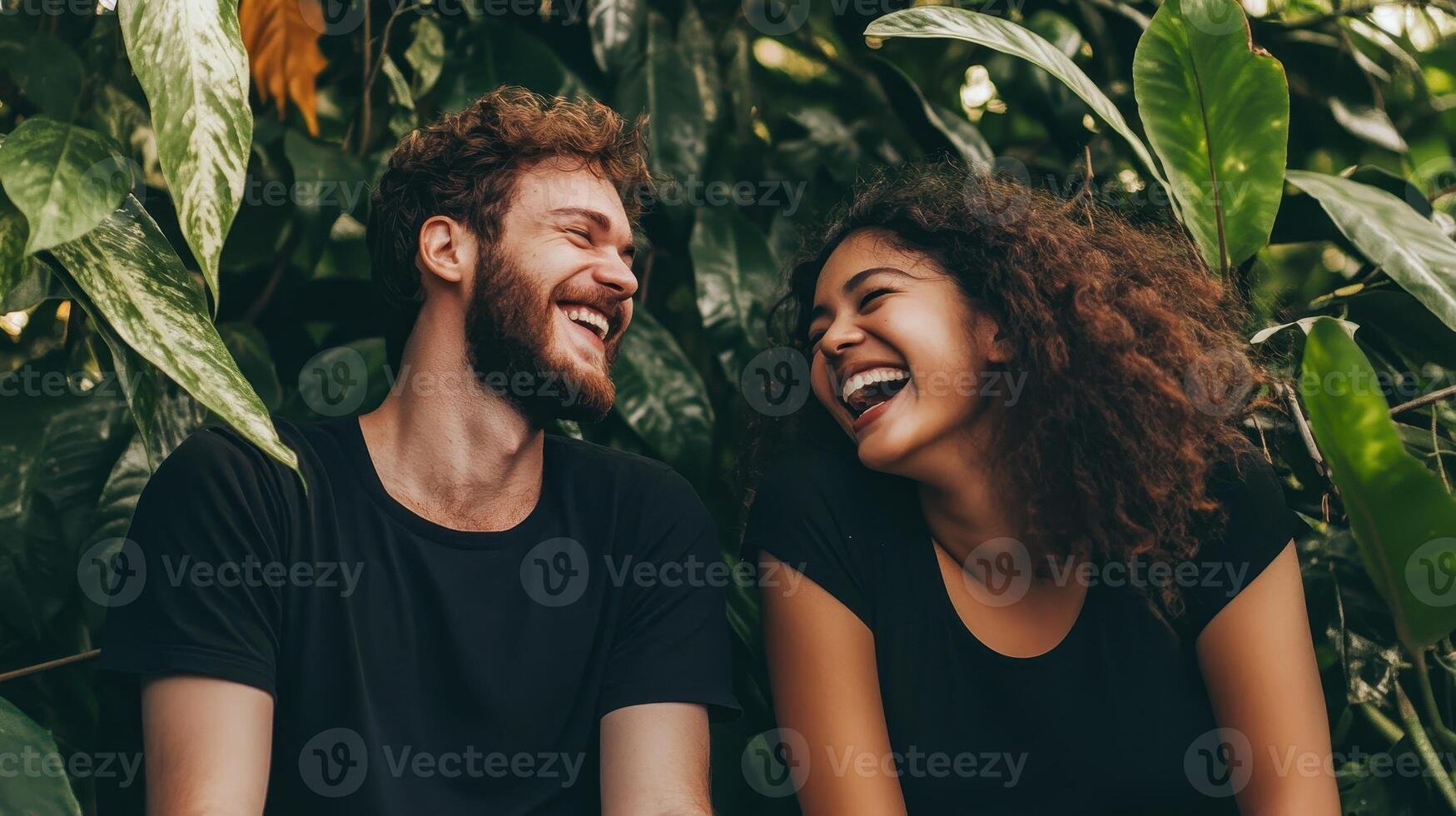 Emotional Value Concept. A joyful couple laughs together amidst lush green foliage, capturing a moment of happiness and connection in nature. photo