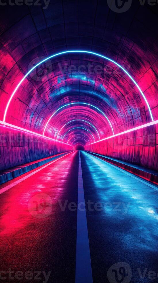 Vibrant neon tunnel illuminated with pink and blue lights at night creating a mesmerizing visual experience photo