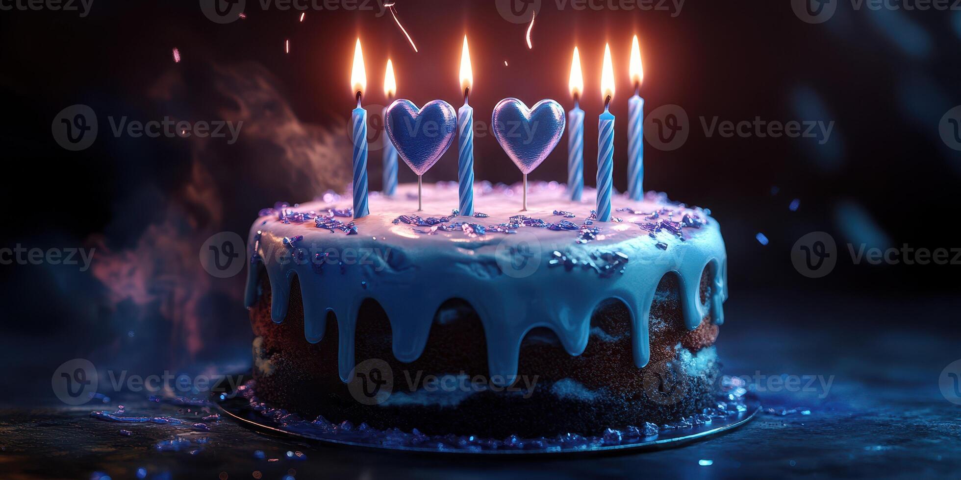 Delicious birthday cake adorned with glowing candles in a festive setting during nighttime celebration photo
