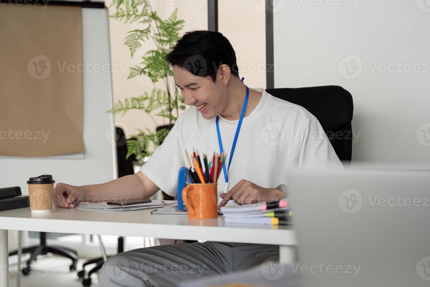 Finance professional analyzing data and preparing tax documents at a desk photo