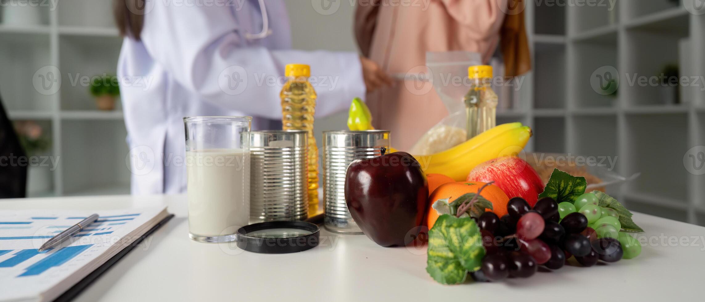 Nutritionist consulting online while holding a bottle of oil, promoting healthy eating habits. photo