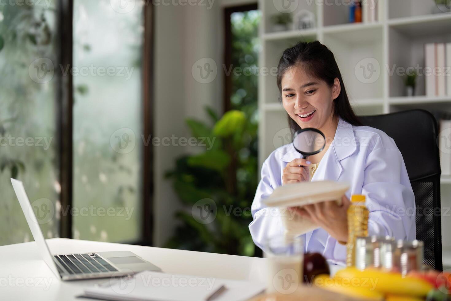 Nutritionist analyzing whole grain bread during an online consultation for dietary advice. photo