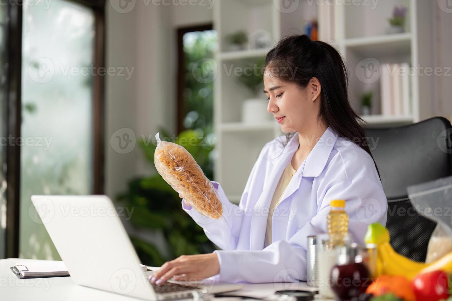 Healthy food options displayed on a table during a nutritionist's consultation with a client. photo