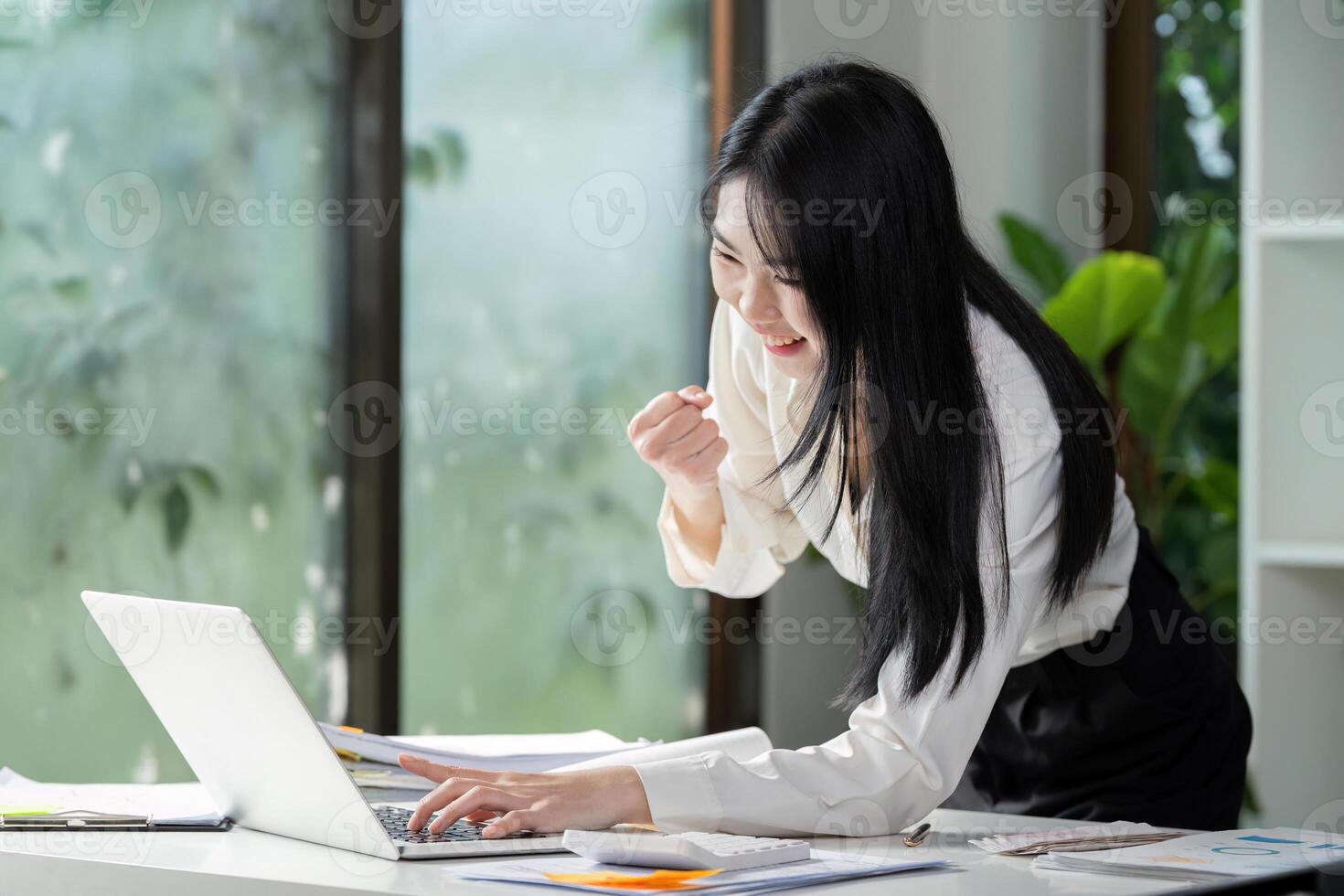 Professional preparing tax documents, focusing on financial filing and calculations. photo
