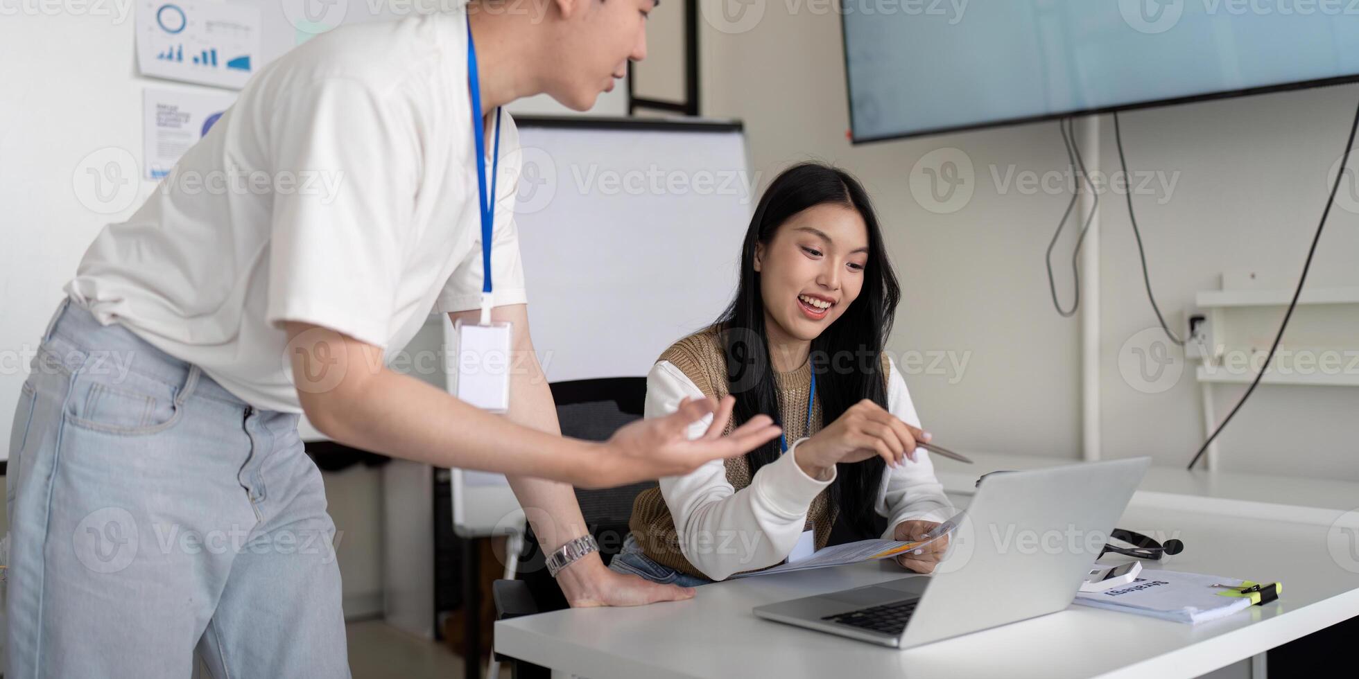 Engaged professionals reviewing financial data and strategies in a collaborative workspace photo