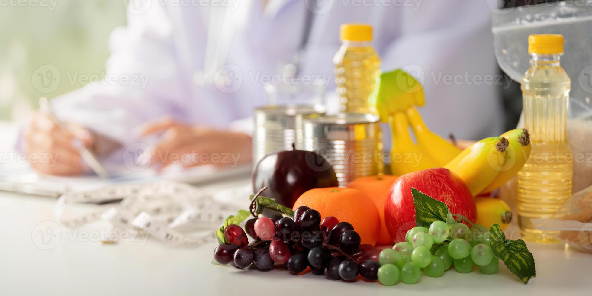 Nutrition and health. A nutritionist analyzing food options with fresh fruits and vegetables. photo