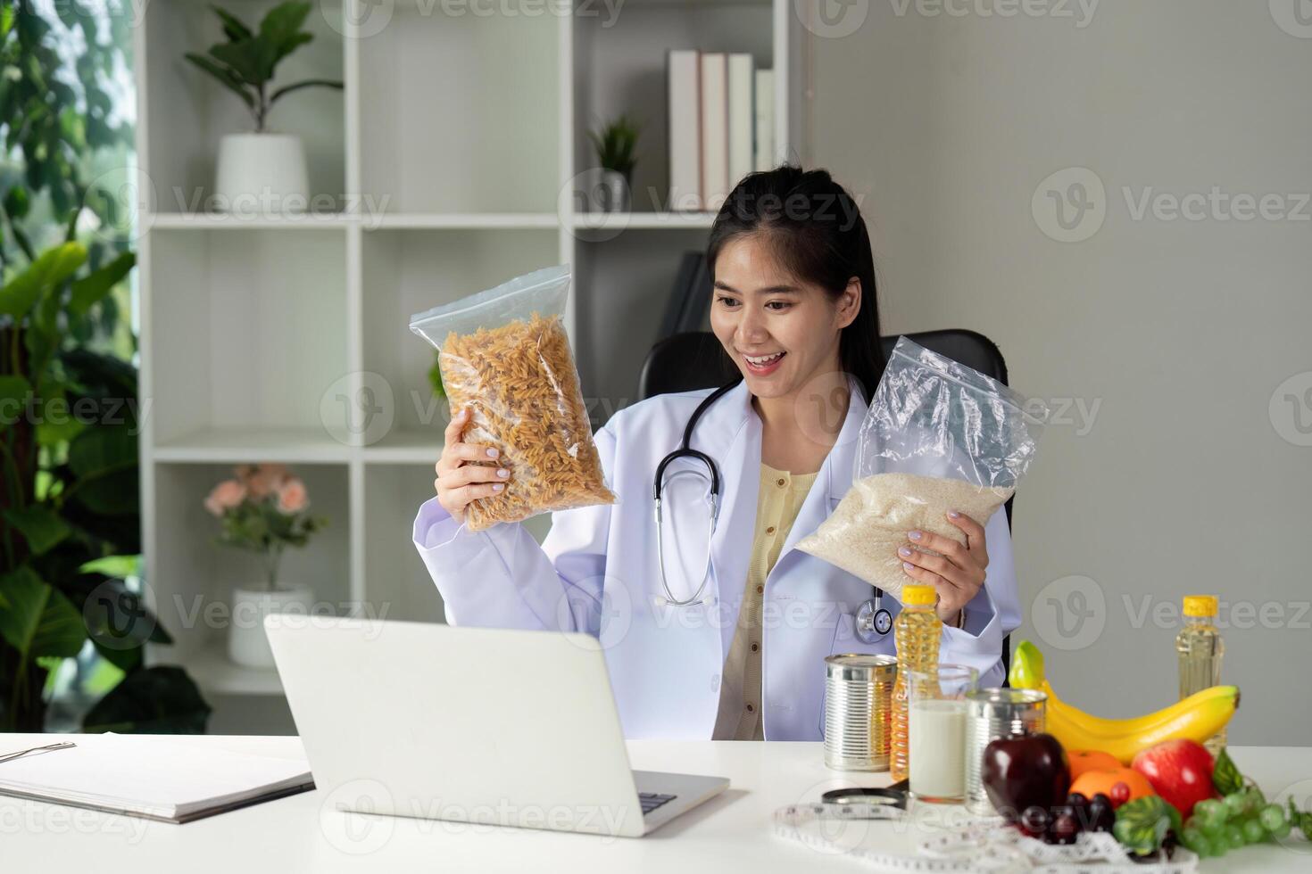 Nutrition consultation. A nutritionist analyzing packaged food products during a virtual session. photo