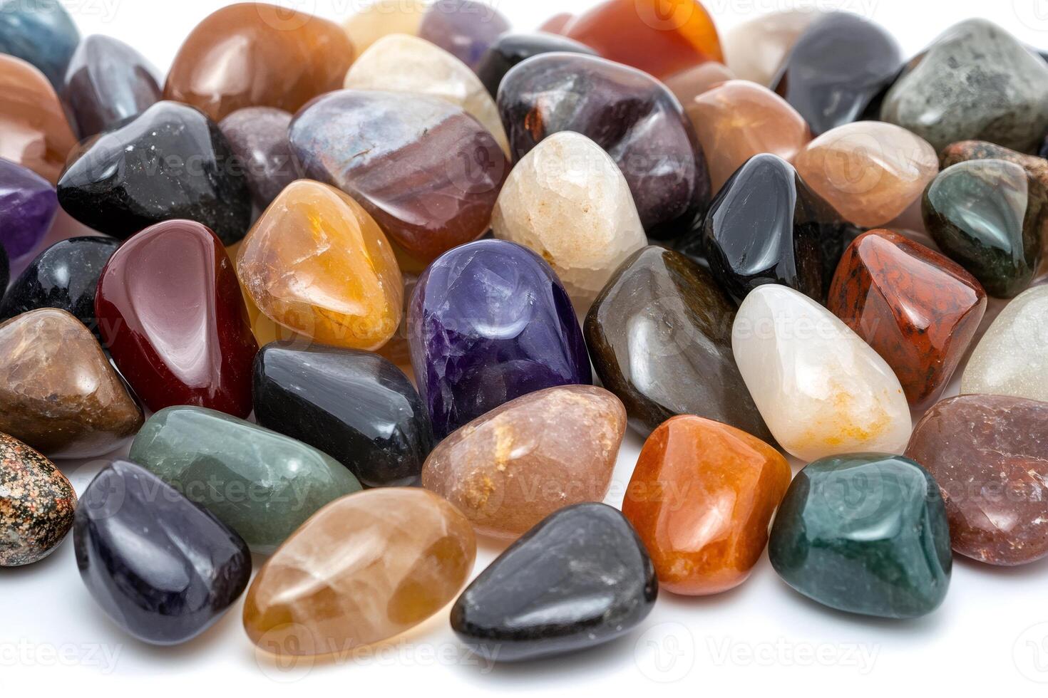 Colorful tumbled gemstones creating a vibrant and diverse arrangement photo