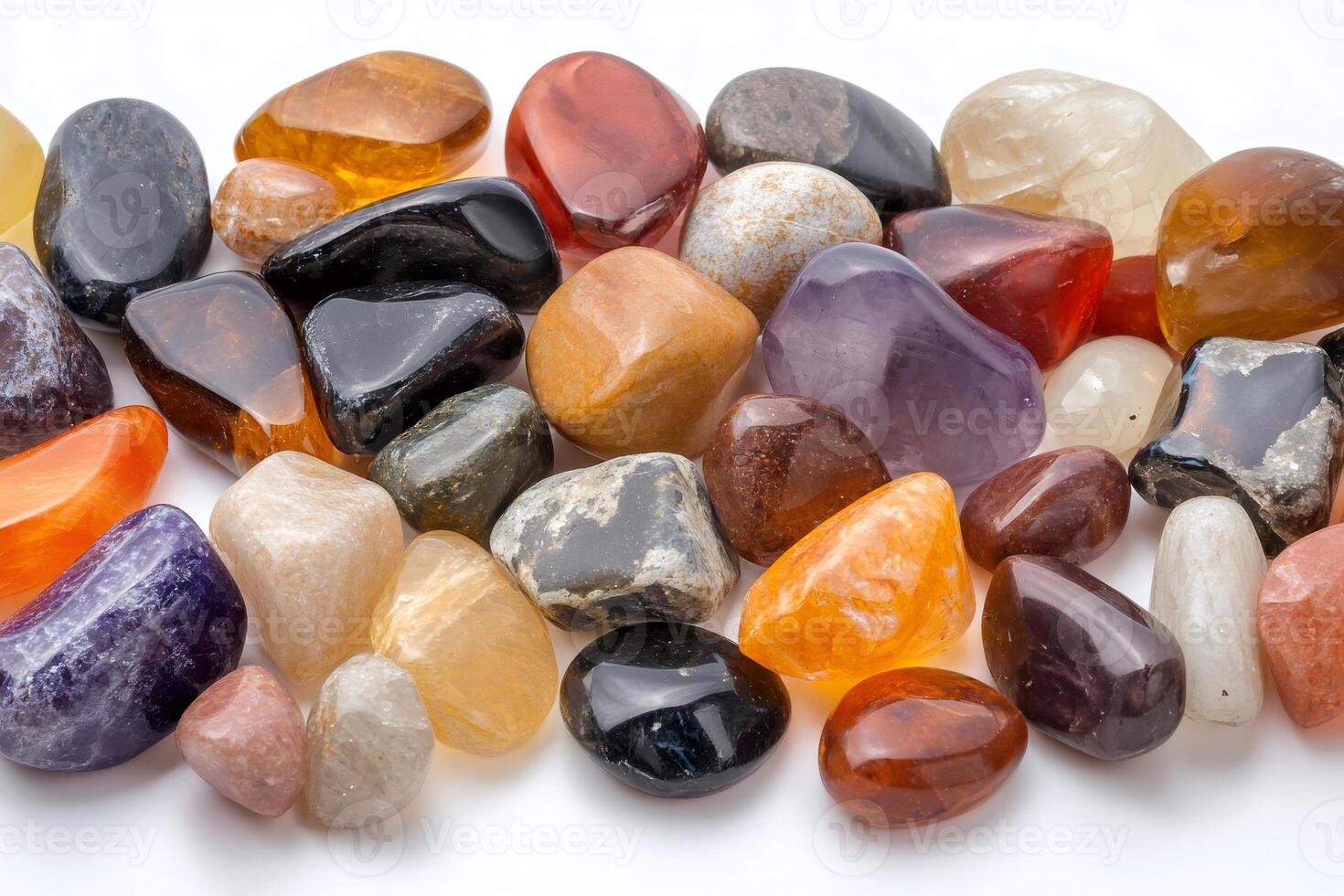 Colorful tumbled gemstones creating a vibrant and diverse collection showcasing healing power and natural beauty photo