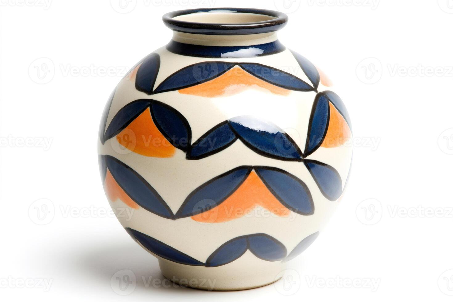 Round ceramic vase with blue and orange leaves pattern standing on white background photo