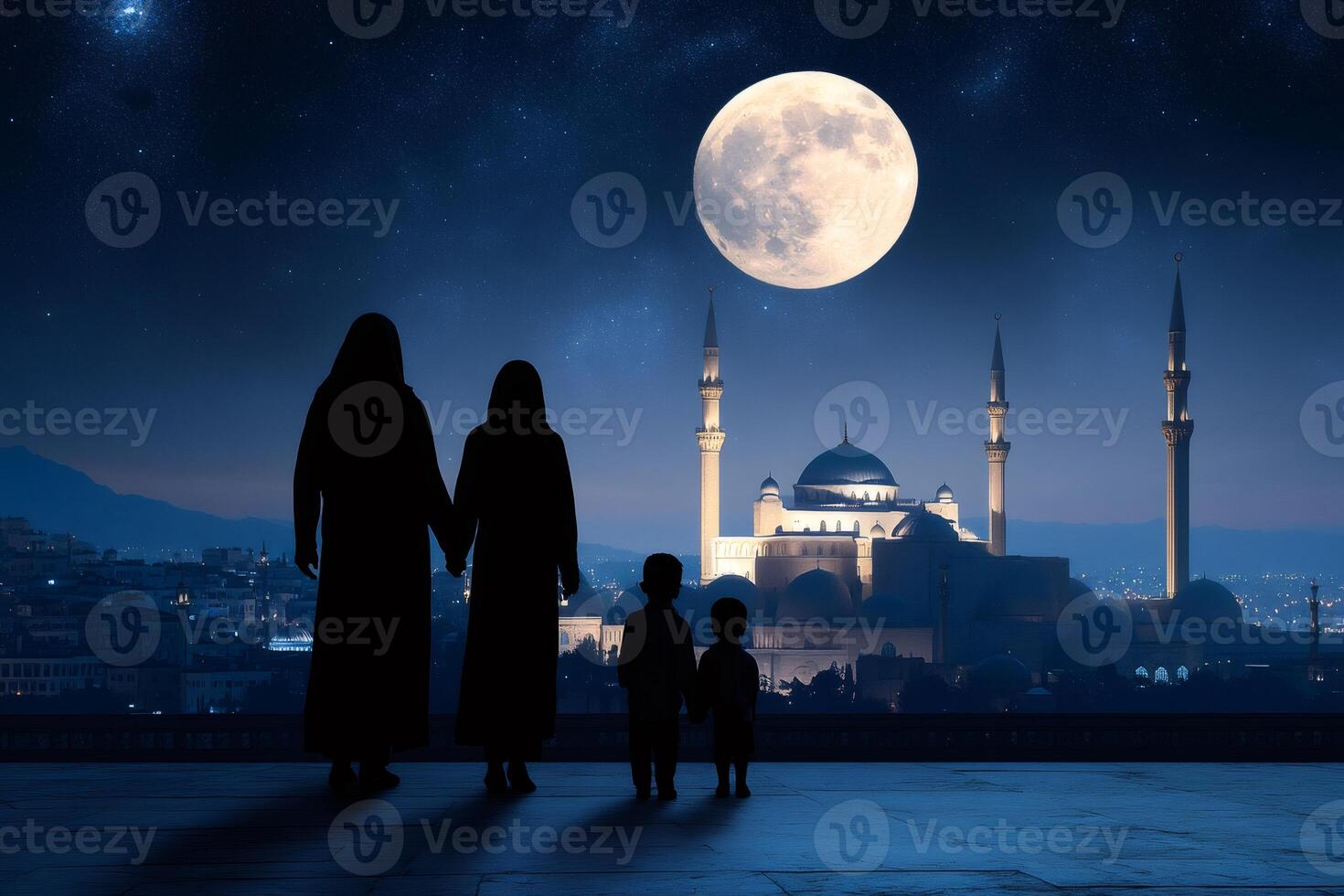 Muslim family looking at illuminated mosque under full moon photo
