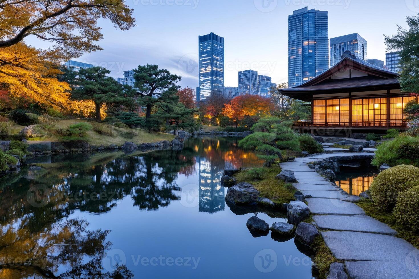 Traditional Japanese house reflecting in pond water at twilight in Tokyo photo