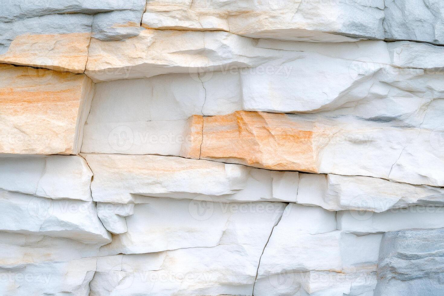 White and orange rock formations creating a natural abstract pattern photo