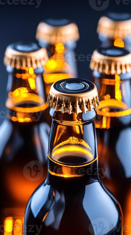 Many unopened beer bottles reflecting warm light are waiting to be opened photo