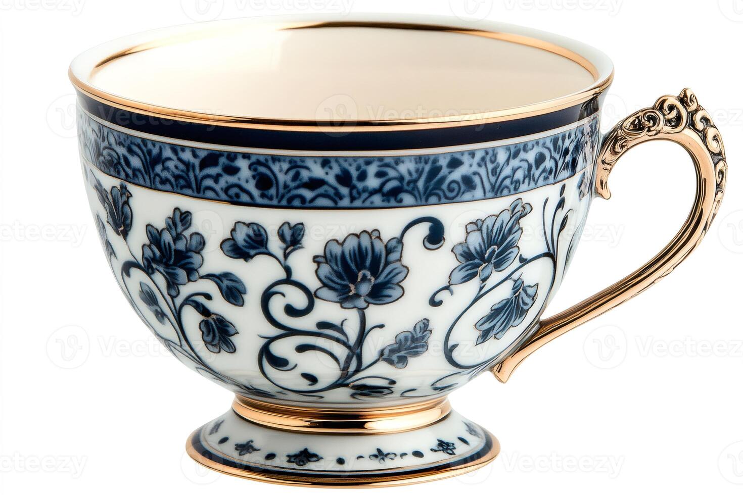 Elegant tea cup with gold decorations and blue floral pattern, perfect for a refined tea time photo