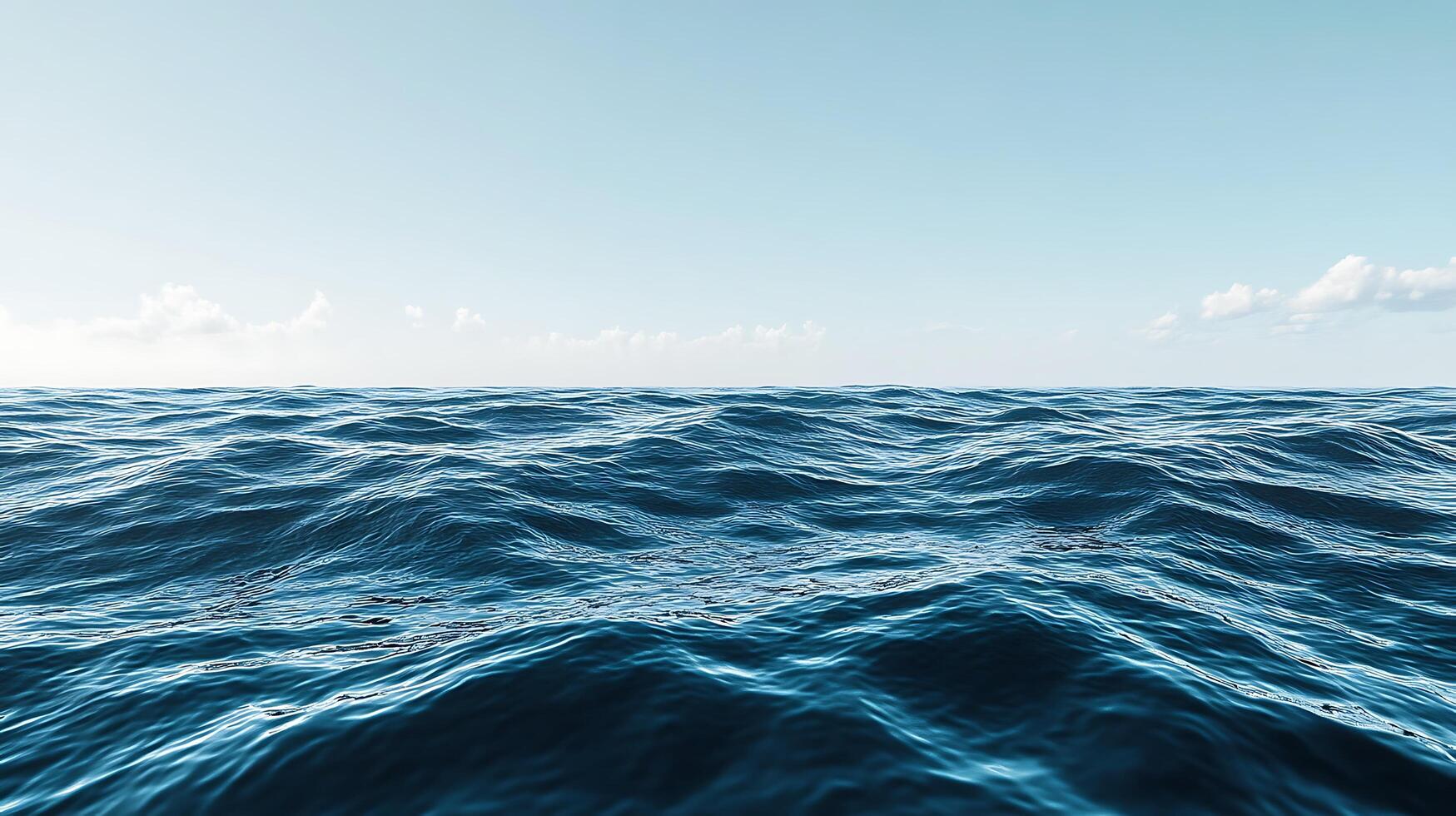 Expansive ocean view with gentle waves under a bright sky conveying tranquility and freedom with vastness of the sea meeting horizon photo