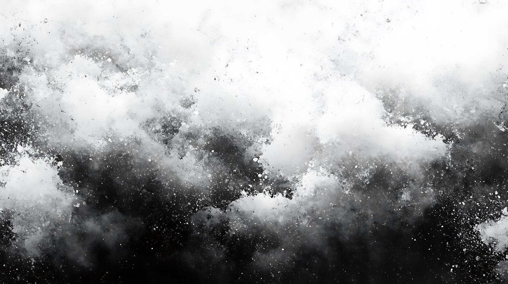 Abstract black and white splatter painting that creates a dynamic visual texture with contrasting light and dark elements photo