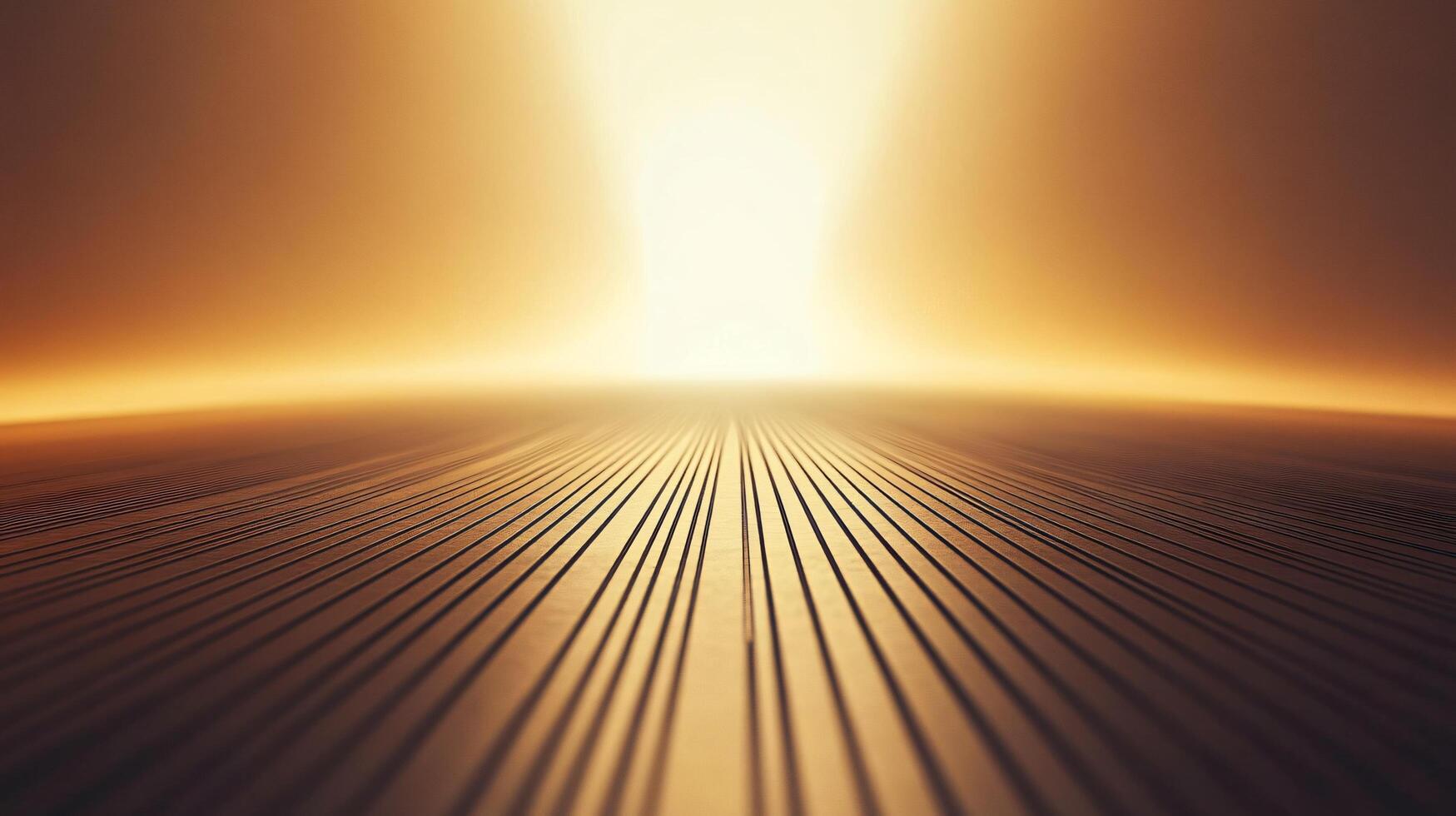 A large empty field with a bright yellow sun in the background photo
